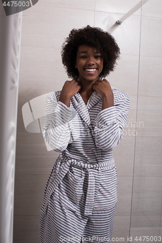 Image of beautiful black woman wearing  bathrobe