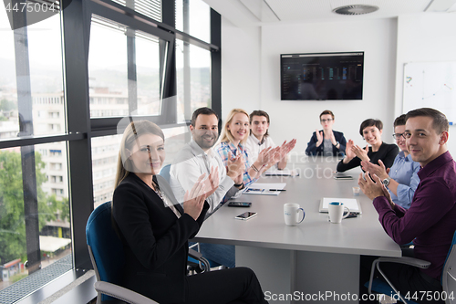 Image of Group of young people meeting in startup office