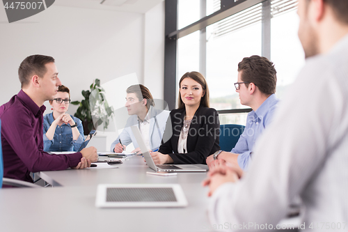 Image of Business Team At A Meeting at modern office building