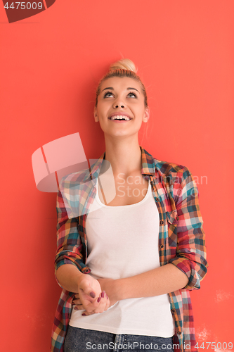 Image of young woman over color background