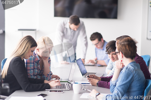 Image of Group of young people meeting in startup office