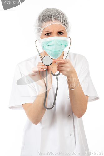 Image of female doctor using st?thoscope