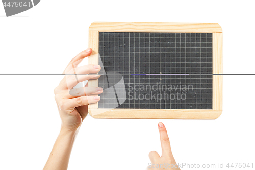 Image of woman\'s hands holding a blackboard publicity