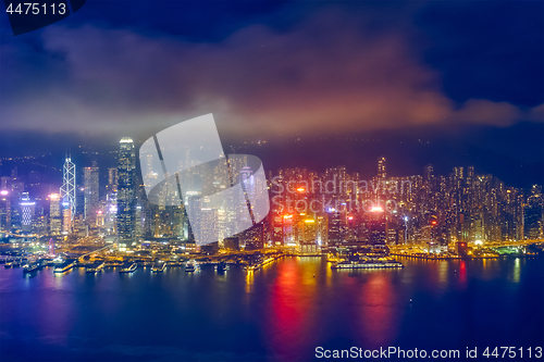 Image of Aerial view of illuminated Hong Kong skyline. Hong Kong, China