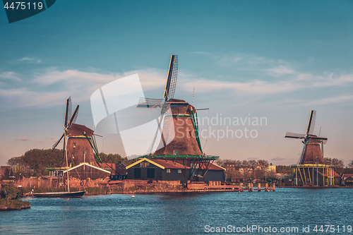 Image of Windmills at Zaanse Schans in Holland in twilight after sunset.