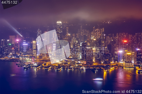 Image of Aerial view of illuminated Hong Kong skyline. Hong Kong, China