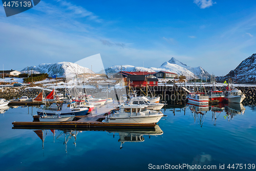 Image of Fishing boats and yachts on pier in Norway