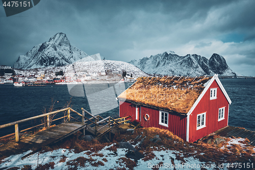 Image of Traditional red rorbu house in Reine village on Lofoten Islands,