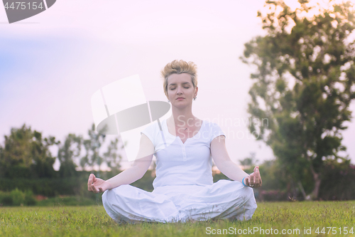 Image of woman doing yoga exercise