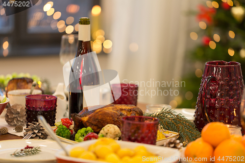 Image of food and drinks on christmas table at home