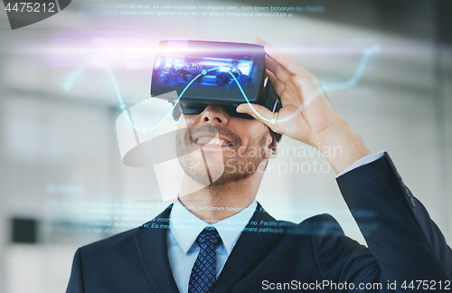 Image of businessman with virtual reality headset at office