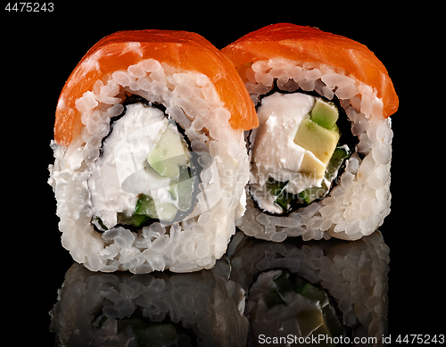 Image of Two pieces of sushi rolls Philadelphia