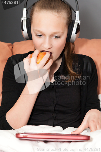 Image of girl with a digital tablet