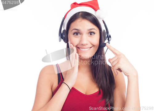 Image of Christmas headset woman from telemarketing call center wearing red santa hat talking smiling isolated on white background.