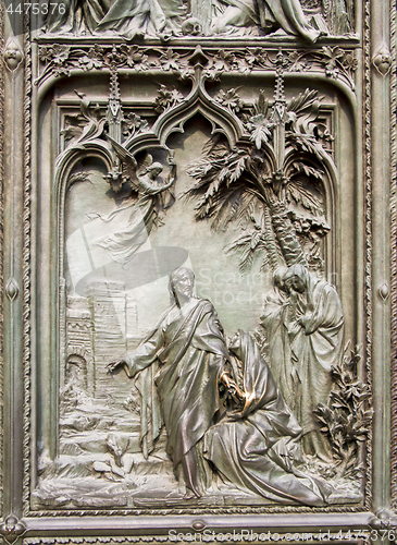 Image of Detail bronze bas-reliefs of the Pieta scene in bas relief at Mi