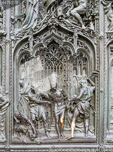 Image of Detail bronze bas-reliefs of the Pieta scene in bas-relief at Mi