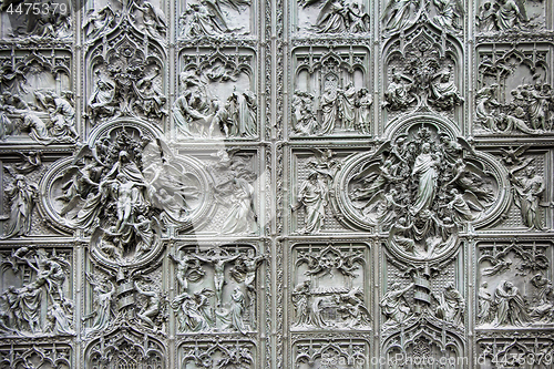 Image of Detail bronze bas-reliefs of the Pieta scene in bas-relief at Mi