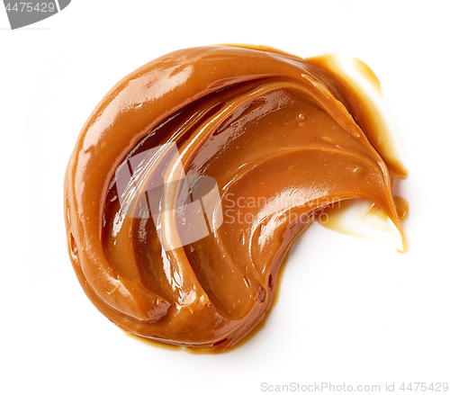 Image of melted caramel on a white background