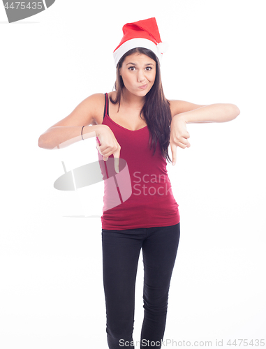 Image of Happy christmas woman pointing