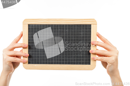 Image of woman\'s hands holding a blackboard publicity