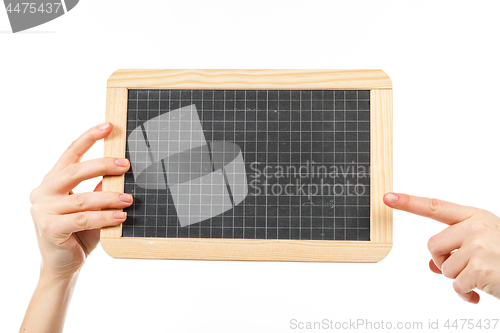 Image of woman\'s hands holding a blackboard publicity
