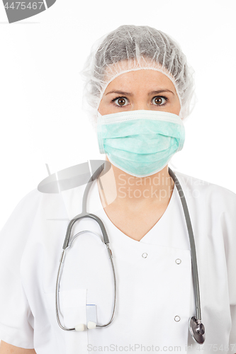 Image of young woman doctor with stethoscope and mask