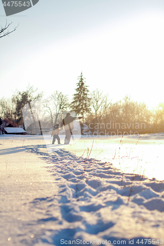 Image of Happy boy grandpa have winter fun