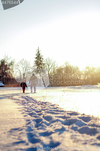 Image of Happy boy grandpa have winter fun