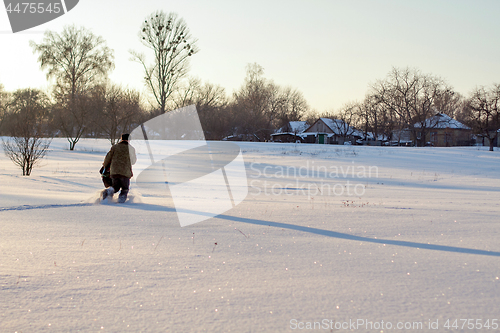 Image of Happy boy grandpa have winter fun