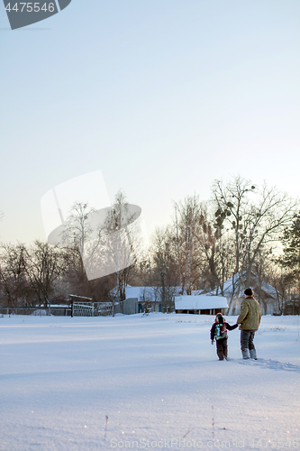 Image of Happy boy grandpa have winter fun