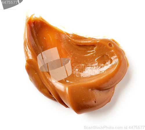 Image of melted caramel on a white background