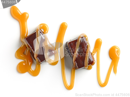 Image of chocolate candies and caramel sauce