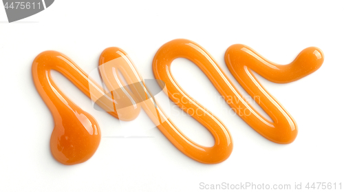 Image of caramel sauce on white background