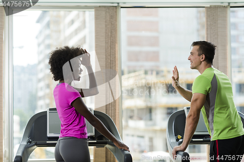 Image of people exercisinng a cardio on treadmill