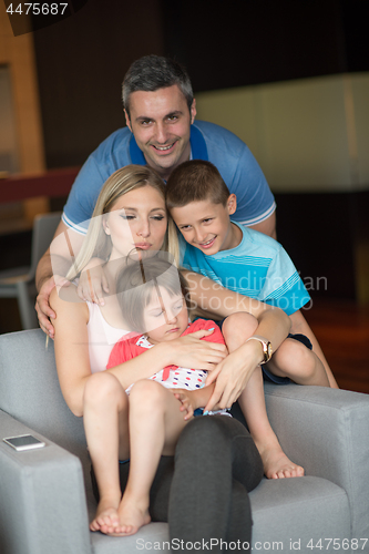 Image of couple spending time with kids