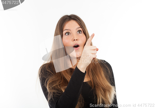 Image of Beautiful young woman showing blank signboard