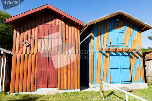 Image of typique colored wooden houses in biganos port in the Bay of Arcachon