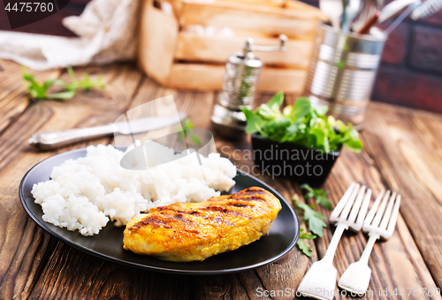 Image of boiled rice with fried chicken breast