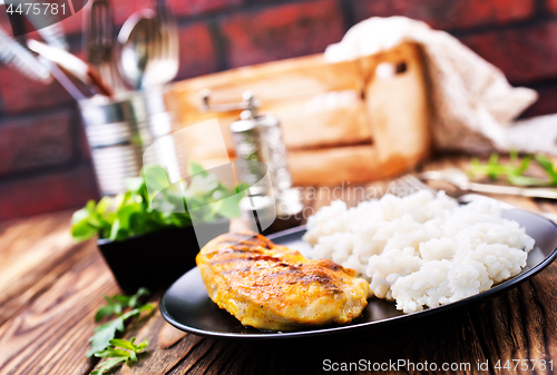 Image of boiled rice with fried chicken breast