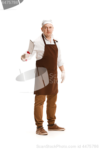 Image of Smiling butcher posing with a cleaver isolated on white background