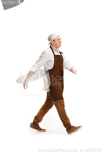 Image of Smiling butcher posing isolated on white background