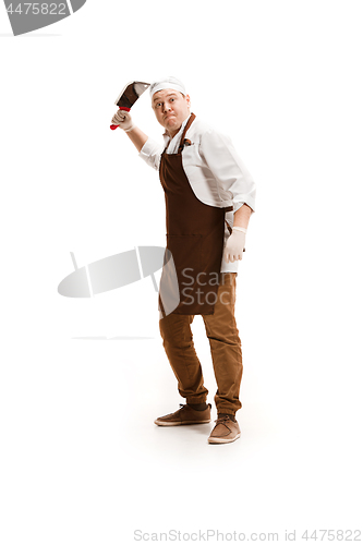 Image of Angry aggressive butcher posing with a cleaver isolated on white background