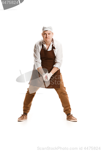 Image of Angry aggressive butcher posing with a cleaver isolated on white background