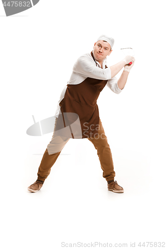 Image of Angry aggressive butcher posing with a cleaver isolated on white background