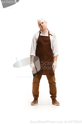 Image of Bored butcher posing with a cleaver isolated on white background