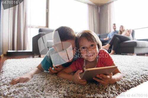 Image of couple spending time with kids