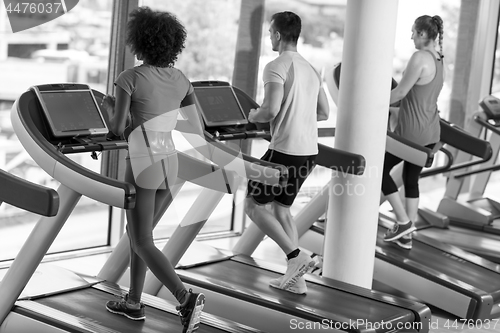 Image of people exercisinng a cardio on treadmill