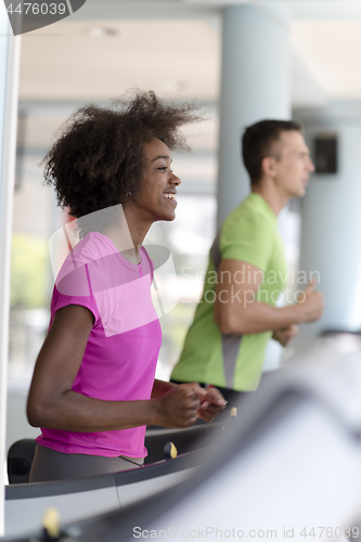 Image of people exercisinng a cardio on treadmill