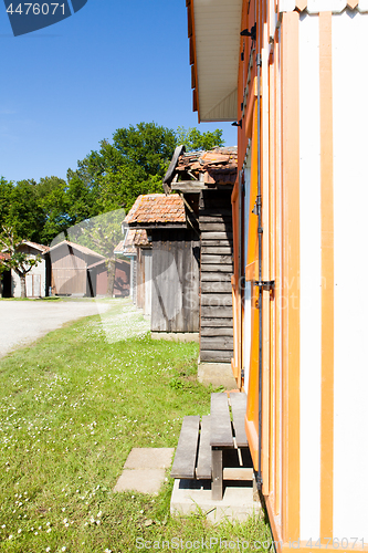 Image of typique colored wooden houses in biganos port in the Bay of Arcachon