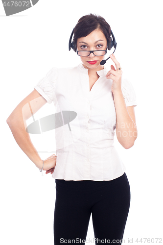 Image of Beautiful young call-center assistant smiling , isolated on white